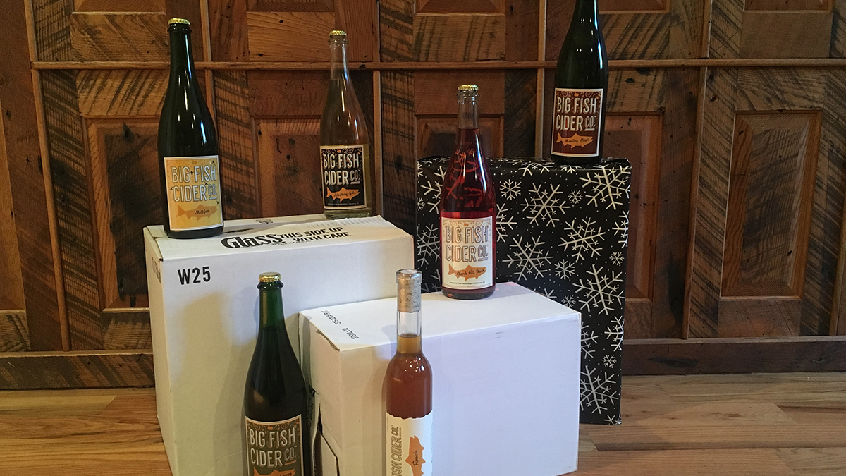 Featured: Bottles of Big Fish Cider on our shipping boxes